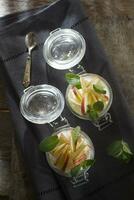 Yogurt with apple and mint photo