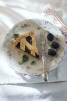 Tart with blackberry jam photo