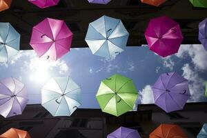 Umbrellas of different colors photo