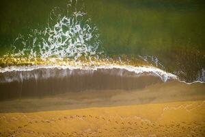 Sea waves on the beach photo