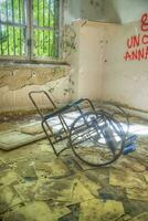 Remains of abandoned hospital photo