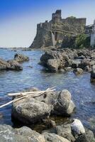 The coast of Aci Castello photo