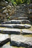 Stairway in ancient stone photo