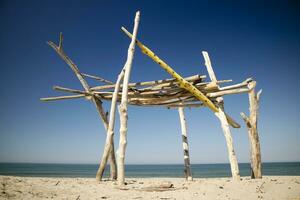 Wooden constructions on the beach photo