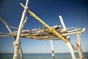 Wooden constructions on the beach photo