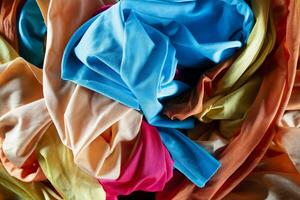 A group of multicolored cloth drapes photo