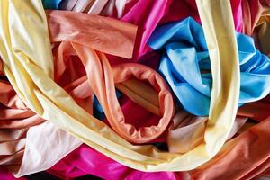 A group of multicolored cloth drapes photo