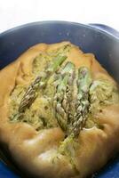Savory pie with spelled flour and asparagus cream photo