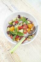 Completely vegan salad with the flavors and colors of summer photo