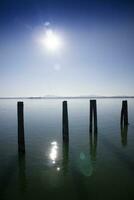 Glimpse of the peaceful Trasimeno lake in Umbria Italy photo