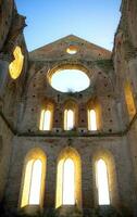 The famous roofless church in San Galgano Tuscany Italy photo