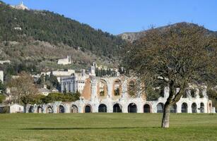 The remains of the Roman amphitheater in Gubbio Italy photo