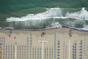 The equipped beach of Viareggio seen from above photo