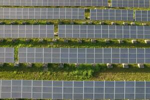 Aerial photograph of a field of solar panels photo