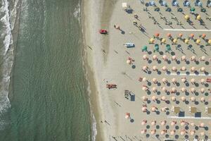 The equipped beach of Lido di Camaiore seen from above photo