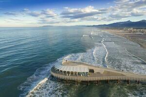 Aerial view at dawn of the pier of Lido di Camaiore Italy photo