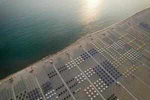 The equipped beach of Viareggio seen from above photo