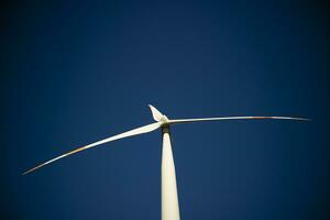 Renewable energy through wind turbines photo