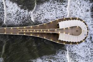 Aerial view at the dawn of the pier of Lido di Camaiore Tuscany Italy photo