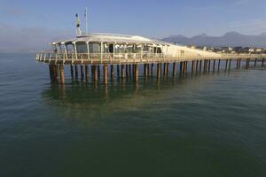 Daytime aerial view of the pier in Lido di Camaiore Tuscany Italy photo