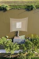 Aerial photograph of old fishing post with net photo