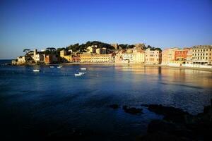 Sunrise view of the Bay of Silence in Sestri Levante Italy photo