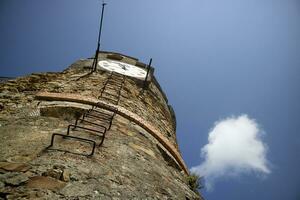 The clock tower in Riomaggiore Cinque Terre photo