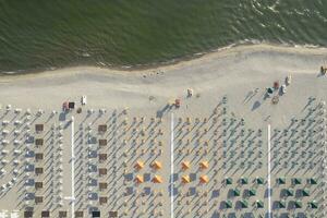 The equipped beach of Versilia seen from above photo