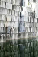 View of a wall after the extraction of the marble photo