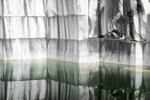 View of a wall after the extraction of the marble photo