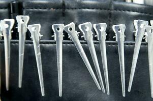a black leather case with many brushes and other tools photo