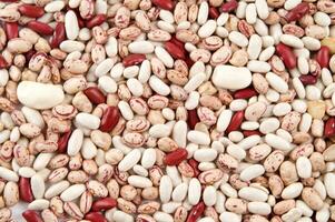 a jar of beans and a glass jar with beans photo