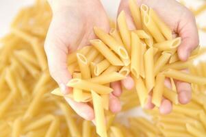 three glass jars filled with pasta photo