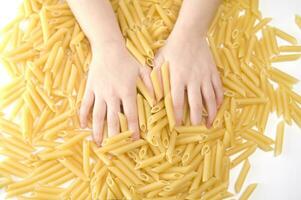 three glass jars filled with pasta photo