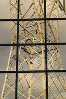 a large electrical tower with wires and wires photo