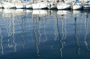 the boats are all white photo