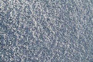 white pebbles are piled up in a pile photo