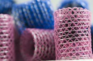 a pile of blue and pink mesh bags photo