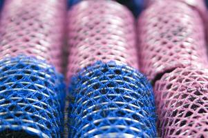 a pile of blue and pink mesh bags photo