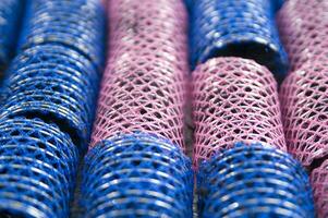 a pile of blue and pink mesh bags photo