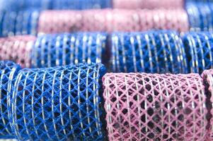 a pile of blue and pink mesh bags photo