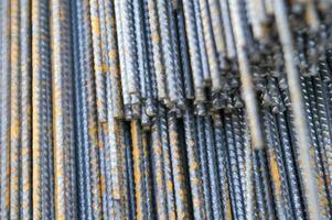 a pile of steel bars with rust on them photo