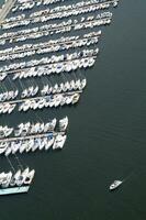 a large number of boats in a marina photo