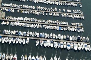 a large number of boats in a marina photo