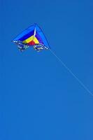 Set of flying colorful kites photo