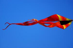 Set of flying colorful kites photo