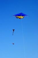 Set of flying colorful kites photo