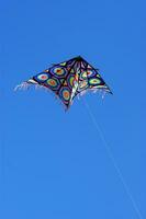 Set of flying colorful kites photo