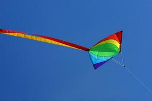 Set of flying colorful kites photo