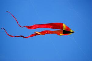 Set of flying colorful kites photo